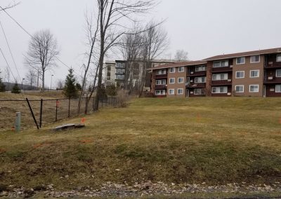 fence line before 400x284 - Apartment Complex Landscape